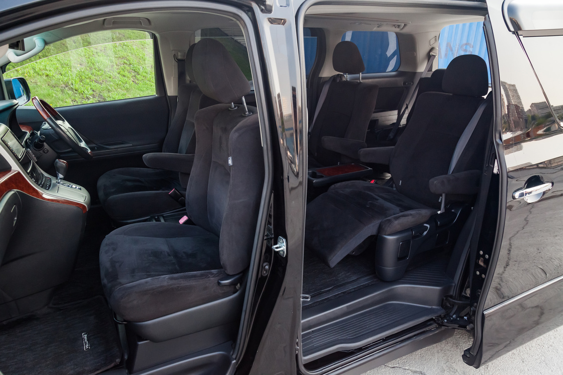 Japanese Luxury Minivan Car Interior View through the Opened Doo